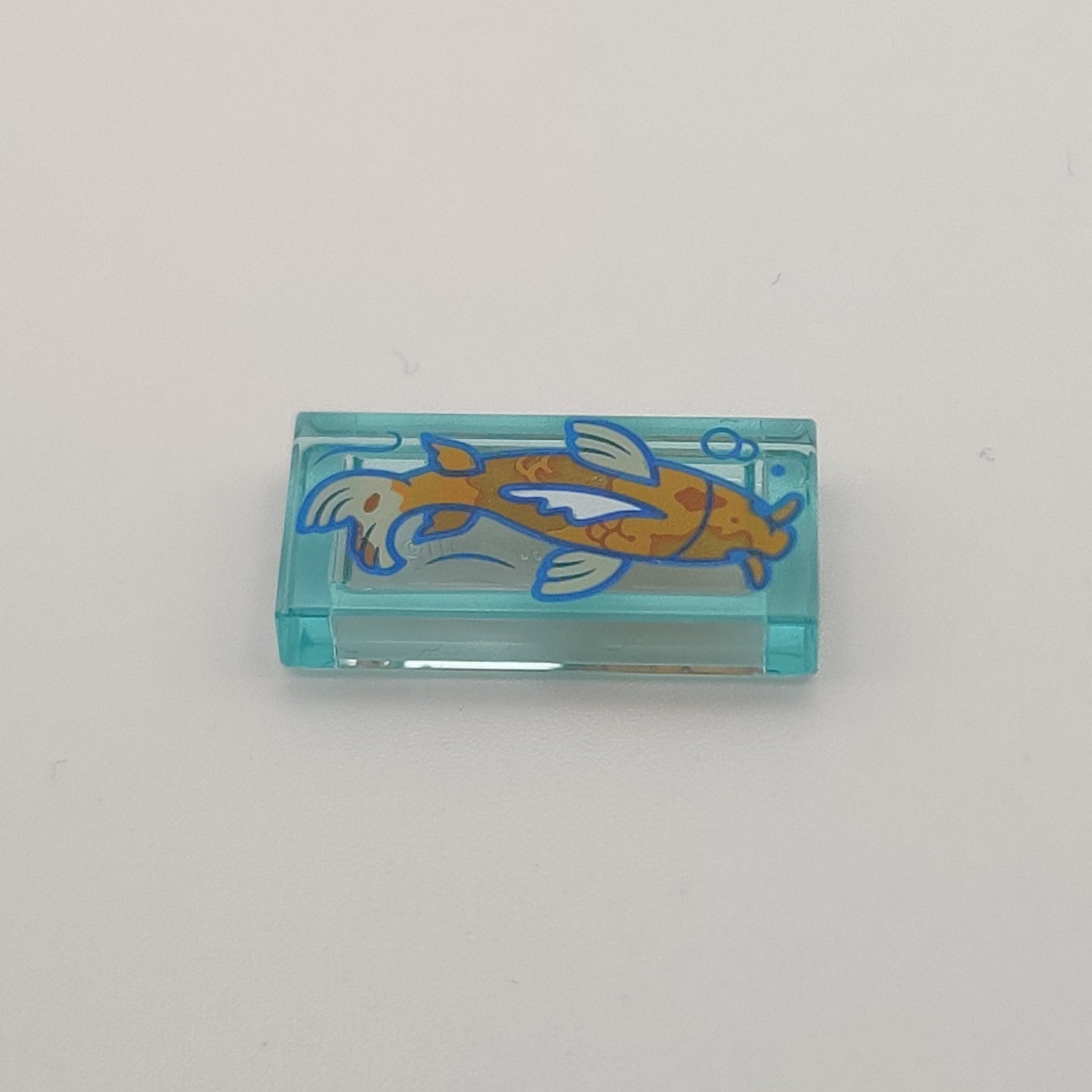 Płytka Tile 1x2 Transparentna – Pomarańczowa Ryba Koi LEGO 3069pb1180